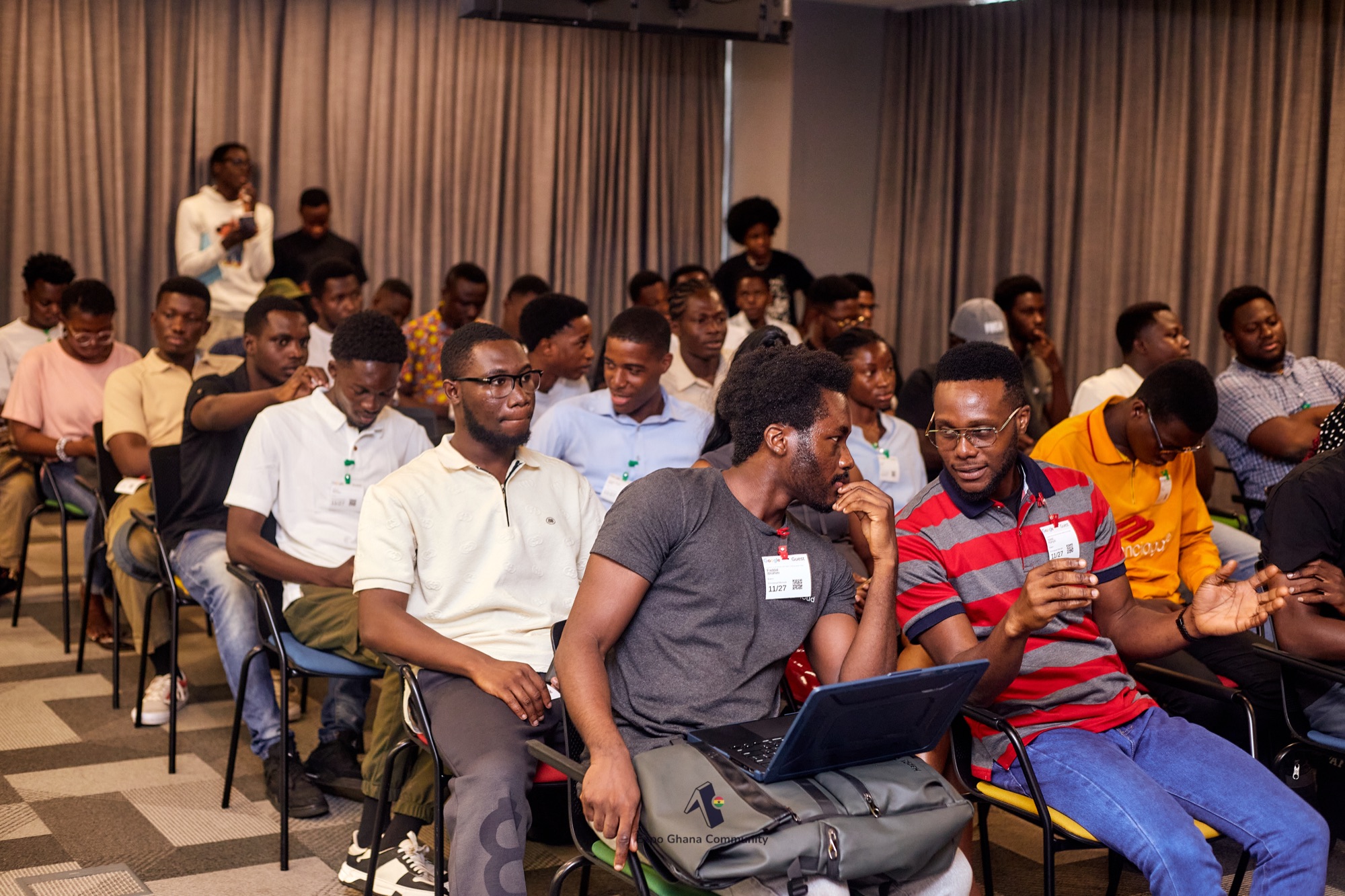 Developers collaborating at a community workshop